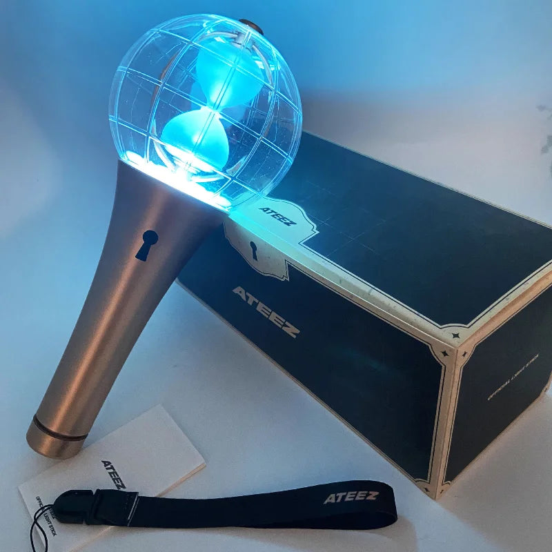 ATEEZ Lightstick - LIGHTINY illuminated in blue aurora mode, showcasing its beautiful and immersive lighting