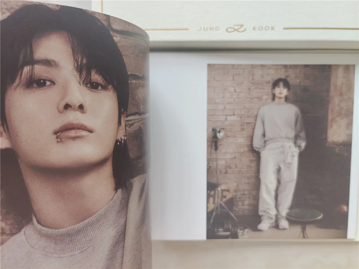 Photobook from BTS Jungkook's solo album 'GOLDEN,' containing exclusive photos and behind-the-scenes images.