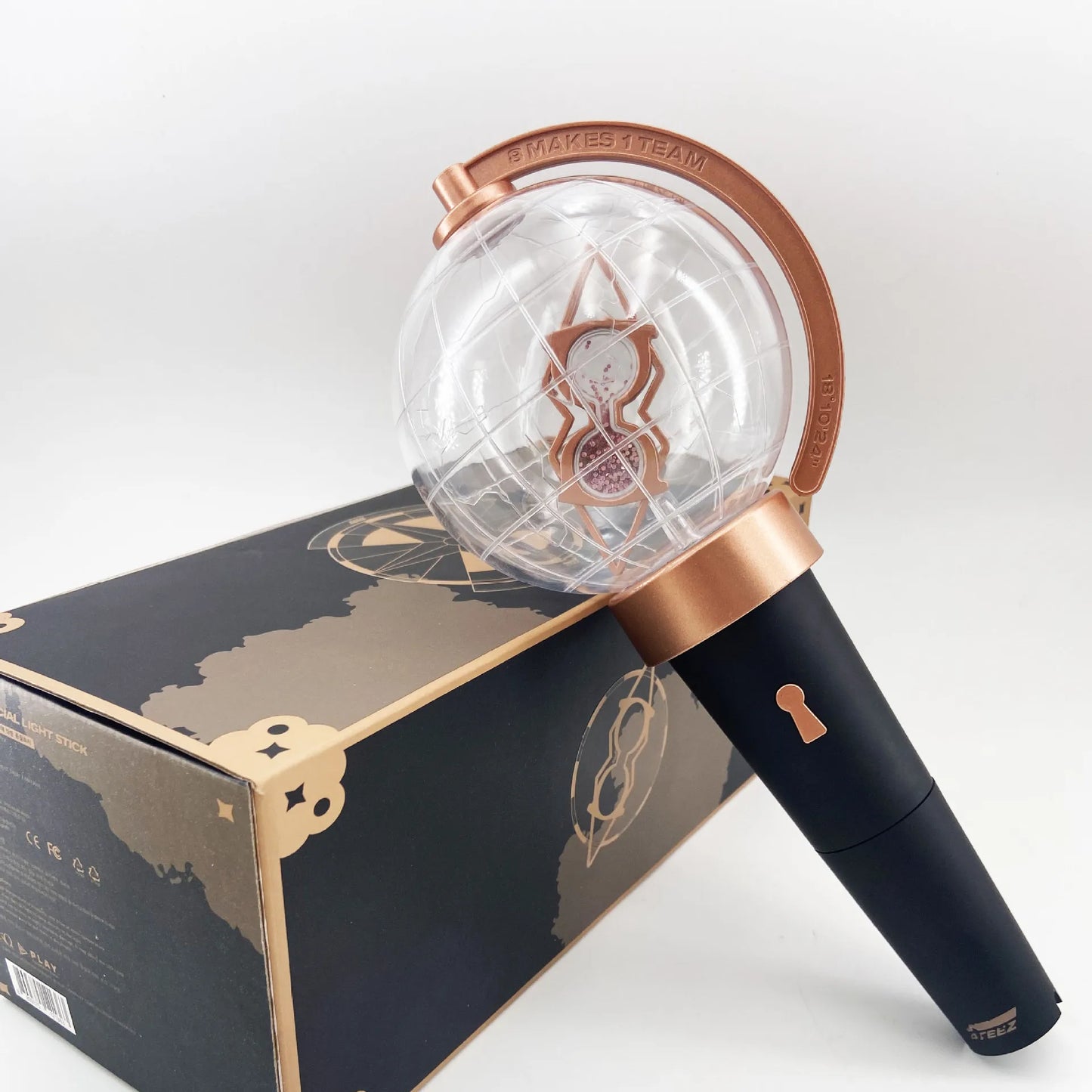 Unboxed ATEEZ Lightstick - LIGHTINY, showcasing the globe-shaped design with a tilted hourglass in the middle