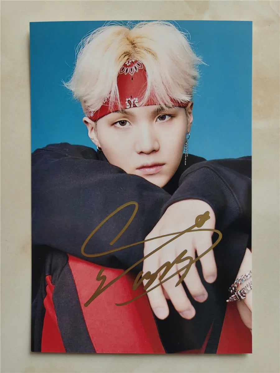 High-definition photo of Suga BTS with his genuine hand signature in real ink