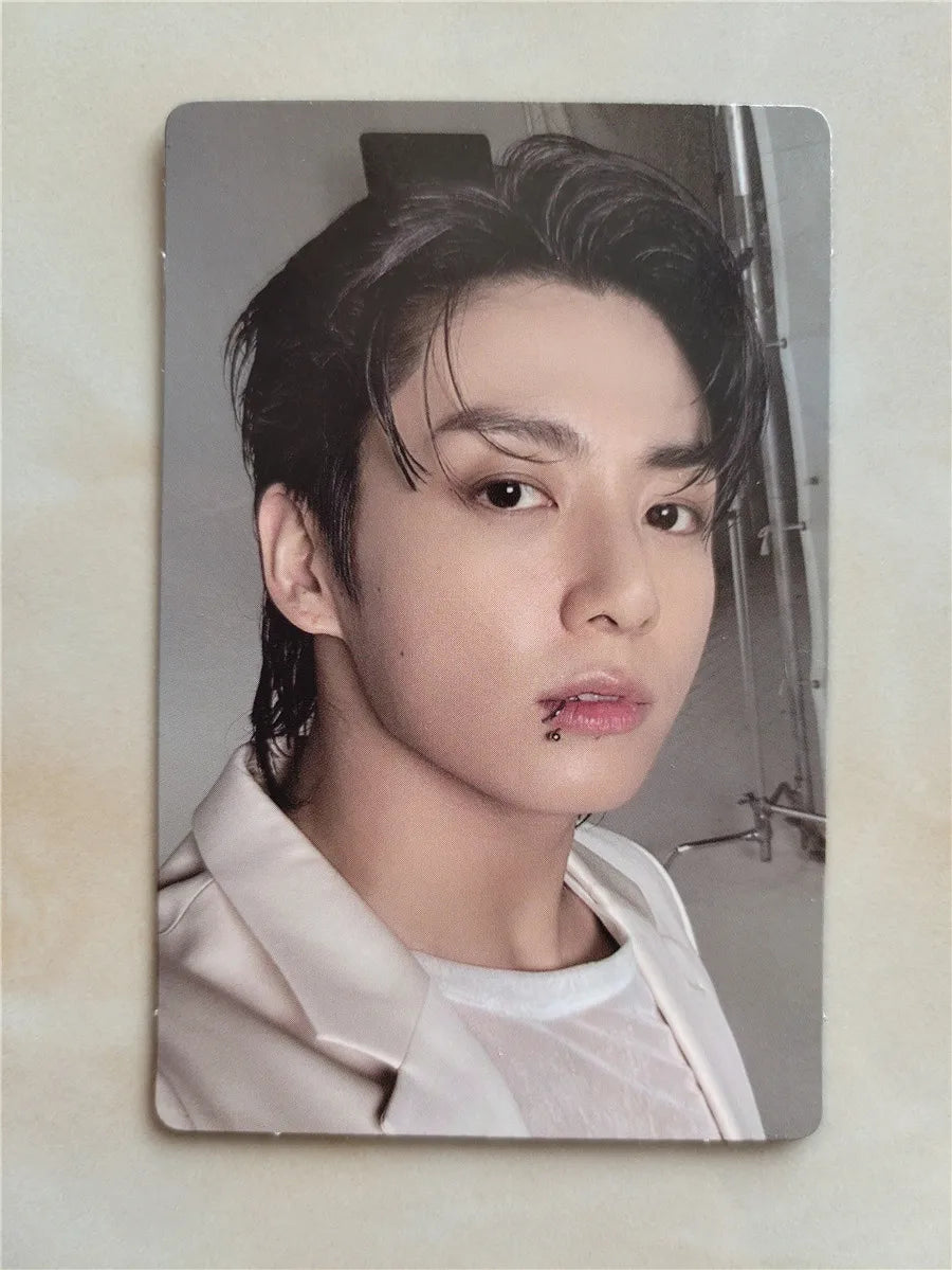 Randomly selected photocard from BTS Jungkook's solo album 'GOLDEN,' featuring high-quality images of Jungkook