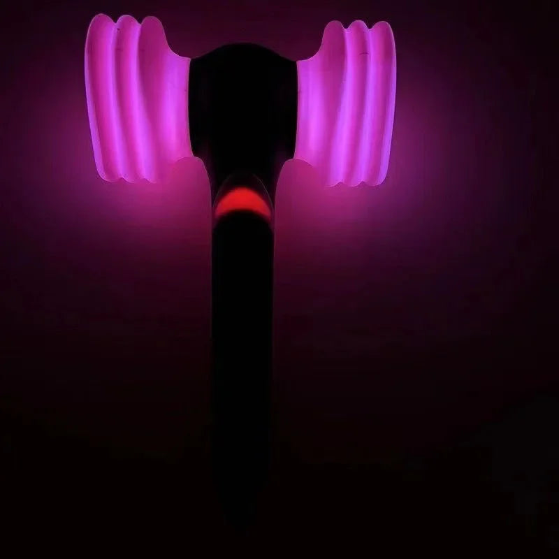 Black Pink Official Lightstick Ver with Bluetooth, lights on in vibrant pink, showcasing its multiple lighting modes