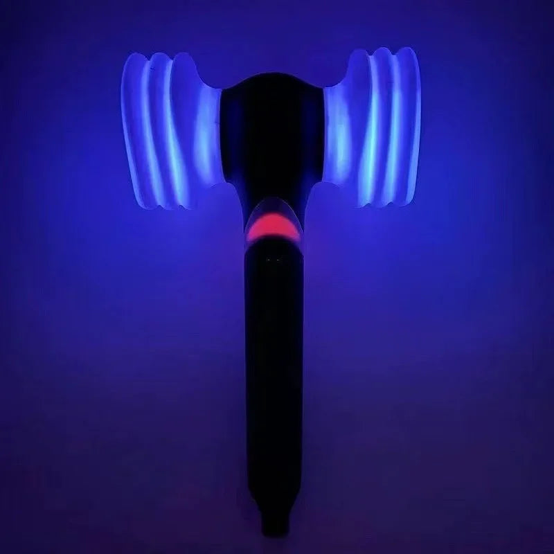 Black Pink Official Lightstick Ver with Bluetooth, lights on in vibrant pink, showcasing its multiple lighting modes