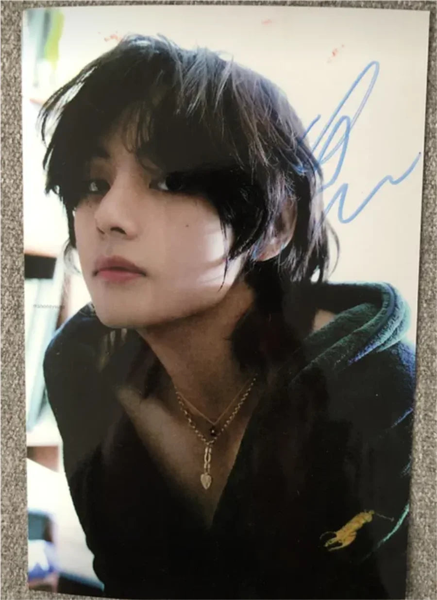 High-definition photo of V from BTS with his genuine hand signature in real ink