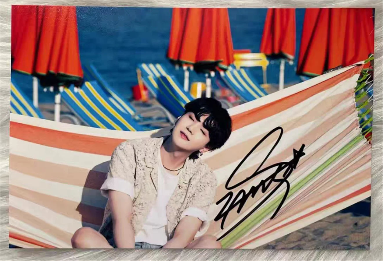 High-definition photo of Suga BTS with his genuine hand signature in real ink